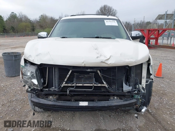 2014 Chevrolet Tahoe LTZ z VIN 1GNSCCE05ER101331, wystawiony jako IAAI lot #41793150 z przebiegiem 177 769 mil mil oraz . Historia ofert i sprzedaży dostępna na DreamBid. Obrazek 12.