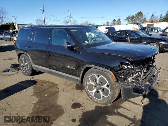2023 Rivian R1S Adventure with VIN 7PDSGABA2PN014942, listed as a Copart auction lot 88597535 with 0 mi miles and Salvage Title. Bid and sale history available at carsss.com. Image 4.