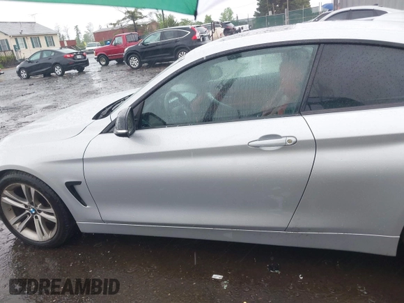 2015 BMW 4 Series 428i with VIN WBA3N3C55FK233180, listed as a IAAI auction lot 42222285 with 190,073 mi miles and . Bid and sale history available at DreamBid. Image 15.