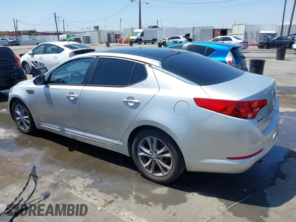 2013 Kia Optima EX with VIN 5XXGN4A75DG139872, listed as a IAAI auction lot 42483921 with 120,167 mi miles and . Bid and sale history available at DreamBid. Image 3.