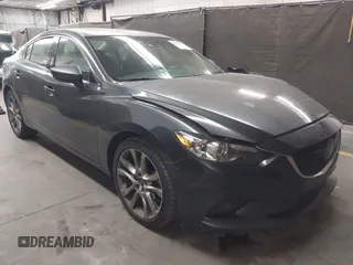 2015 Mazda 6 i Grand Touring with VIN JM1GJ1W58F1199550, listed as a IAAI auction lot 42064381 with 145,465 mi miles. Bid and sale history available at carsss.com. Image 1.