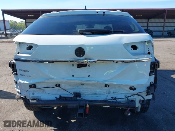 2021 Volkswagen Atlas SEL z VIN 1V2EE2CA2MC227667, wystawiony jako IAAI lot #41886405 z przebiegiem 41 928 mil mil oraz . Historia ofert i sprzedaży dostępna na DreamBid. Obrazek 6.