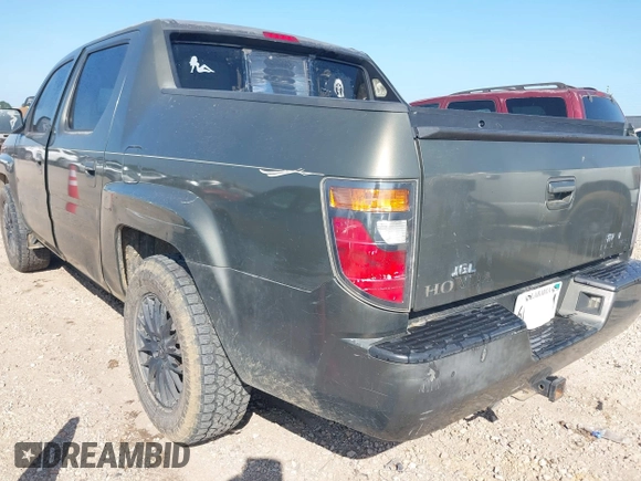 2006 Honda Ridgeline RTL with VIN 2HJYK165X6H512922, listed as a IAAI auction lot 42706885 with 227,241 mi miles and . Bid and sale history available at DreamBid. Image 3.