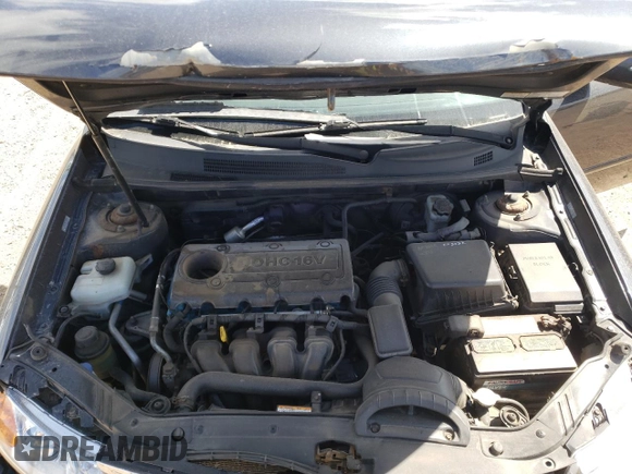 2010 Kia Optima LX z VIN KNAGG4A86A5451165, wystawiony jako Copart lot #52763415 z przebiegiem 213 958 mil mil oraz Szkoda całkowita • Salvage title. Historia ofert i sprzedaży dostępna na DreamBid. Obrazek 11.
