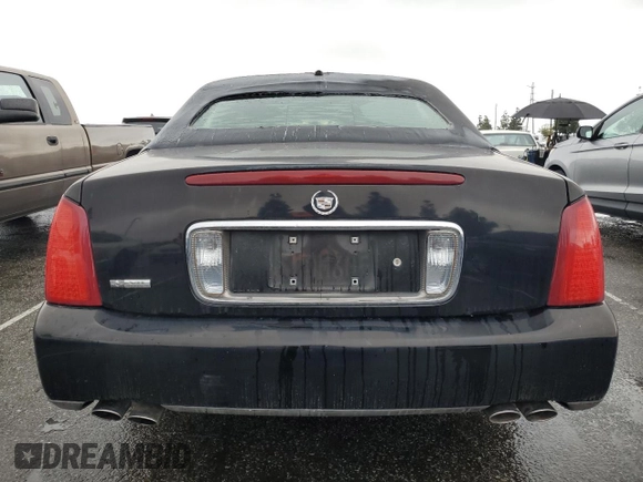 2005 Cadillac DeVille Limousine z VIN 1GEEH90Y05U550363, wystawiony jako Copart lot #55697945 z przebiegiem 47 196 mil mil oraz Czysty tytuł • Clean title. Historia ofert i sprzedaży dostępna na DreamBid. Obrazek 6.