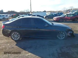 2018 BMW 3 Series 320i xDrive with VIN WBA8E5G57JNU47770, listed as a IAAI auction lot 41409122 with 62,198 mi miles. Bid and sale history available at carsss.com. Image 13.