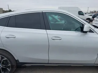2020 BMW X6 xDrive40i z VIN 5UXCY6C09L9C52142, wystawiony jako IAAI lot #41593337 z przebiegiem 61 892 mil mil oraz . Historia ofert i sprzedaży dostępna na DreamBid. Obrazek 13.