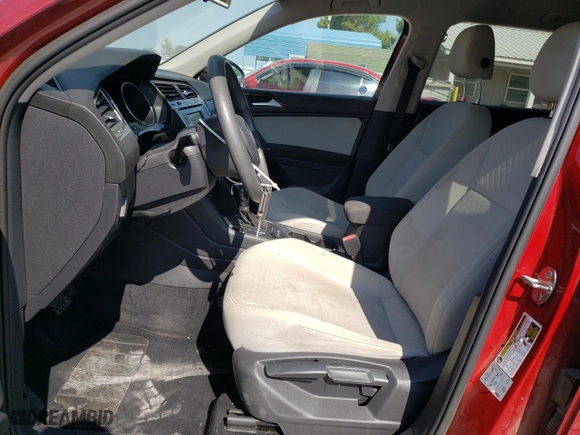 2018 Volkswagen Tiguan S with VIN 3VV0B7AX2JM040787, listed as a Copart auction lot 67389614 with 92,424 mi miles and Salvage Title. Bid and sale history available at carsss.com. Image 7.