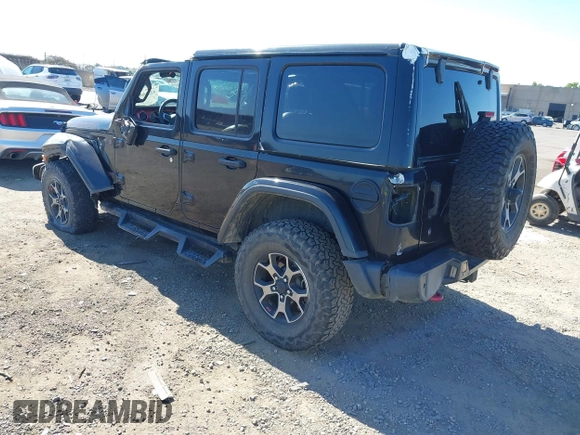 2018 Jeep Wrangler Unlimited Rubicon with VIN 1C4HJXFGXJW255881, listed as a IAAI auction lot 42316499 with 39,439 mi miles and . Bid and sale history available at DreamBid. Image 3.