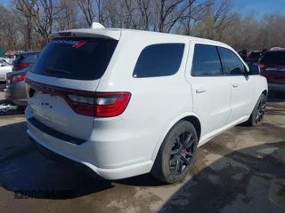 2018 Dodge Durango SRT with VIN 1C4SDJGJXJC395094, listed as a IAAI auction lot 41857351 with 90,106 mi miles and . Bid and sale history available at DreamBid. Image 4.