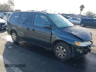 2004 Honda Odyssey EX-L with VIN 5FNRL18094B014575, listed as a IAAI auction lot 41658028 with 223,644 mi miles and . Bid and sale history available at DreamBid. Image 1.