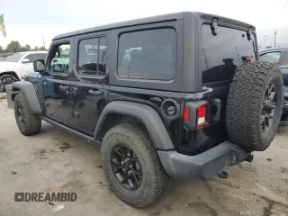 2022 Jeep Wrangler Unlimited High Tide with VIN 1C4HJXDG4NW179888, listed as a Copart auction lot 82601624 with 15,631 mi miles and Salvage Title. Bid and sale history available at DreamBid. Image 2.