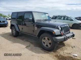 2011 Jeep Wrangler Unlimited Rubicon with VIN 1J4BA6H16BL561658, listed as a Copart auction lot 58379755 with 103,587 mi miles and Salvage title. Bid and sale history available at DreamBid. Image 4.