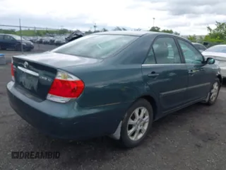 2006 Toyota Camry STD z VIN 4T1BE30K16U109299, wystawiony jako IAAI lot #42305401 z przebiegiem 300 503 mil mil oraz . Historia ofert i sprzedaży dostępna na DreamBid. Obrazek 4.