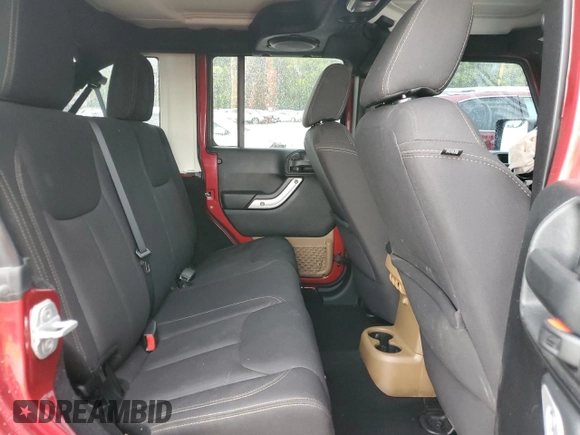 2013 Jeep Wrangler Unlimited Rubicon with VIN 1C4HJWFG6DL565462, listed as a Copart auction lot 51333785 with 113,601 mi miles and Salvage title. Bid and sale history available at DreamBid. Image 11.