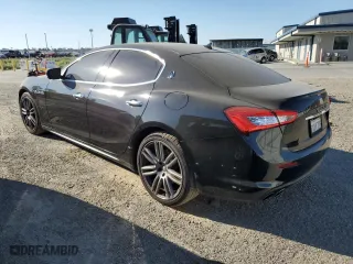 2018 Maserati Ghibli with VIN ZAM57XSA4J1268685, listed as a Copart auction lot 62302313 with 76,576 mi miles. Bid and sale history available at carsss.com. Image 2.