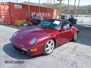 1997 Porsche 911 with VIN WP0AA2998VS322699, listed as a IAAI auction lot 41892833 with 117,174 mi miles and . Bid and sale history available at DreamBid. Image 2.