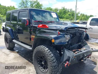 2012 Jeep Wrangler Unlimited Sport with VIN 1C4BJWDG3CL177595, listed as a IAAI auction lot 42238028 with 81,419 mi miles and . Bid and sale history available at DreamBid. Image 1.