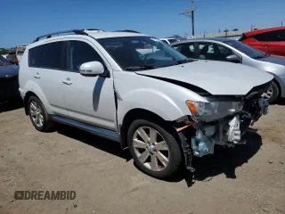 2012 Mitsubishi Outlander SE z VIN JA4AS3AW9CU031502, wystawiony jako Copart lot #57975515 z przebiegiem 115 602 mil mil oraz Tytuł czysty. Historia ofert i sprzedaży dostępna na DreamBid. Obrazek 4.