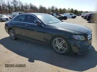 2018 Mercedes-Benz E-Class E 300 with VIN WDDZF4KBXJA381398, listed as a Copart auction lot 51278815 with 83,871 mi miles and Salvage Title. Bid and sale history available at carsss.com. Image 4.