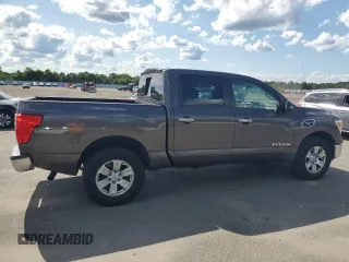 2017 Nissan Titan SV z VIN 1N6AA1EJ9HN543447, wystawiony jako Copart lot #57622105 z przebiegiem 105 975 mil mil oraz Nie do naprawy • Non repairable. Historia ofert i sprzedaży dostępna na DreamBid. Obrazek 3.