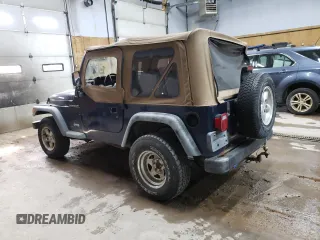 2000 Jeep Wrangler SE with VIN 1J4FA29P1YP739555, listed as a Copart auction lot 58501025 with 128,458 mi miles and Clean title. Bid and sale history available at DreamBid. Image 2.