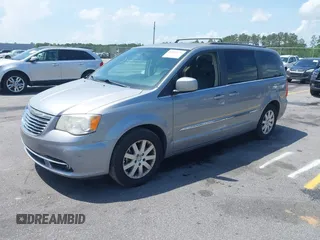 2014 Chrysler Town & Country Touring with VIN 2C4RC1BG7ER271455, listed as a IAAI auction lot 42102571 with 140,578 mi miles. Bid and sale history available at carsss.com. Image 2.