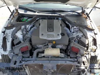 2014 Infiniti Q50 Premium z VIN JN1BV7AP5EM685839, wystawiony jako Copart lot #51238415 z przebiegiem 128 933 mil mil oraz Szkoda całkowita • Salvage title. Historia ofert i sprzedaży dostępna na DreamBid. Obrazek 13.