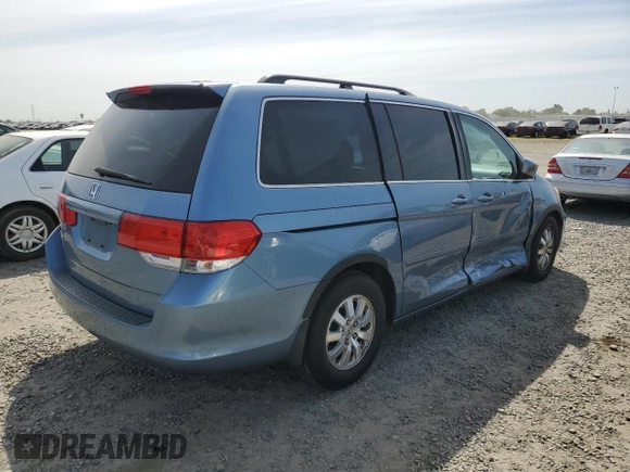 2008 Honda Odyssey EX-L z VIN 5FNRL38738B037025, wystawiony jako Copart lot #53354455 z przebiegiem 161 291 mil mil oraz Szkoda całkowita • Salvage title. Historia ofert i sprzedaży dostępna na DreamBid. Obrazek 3.