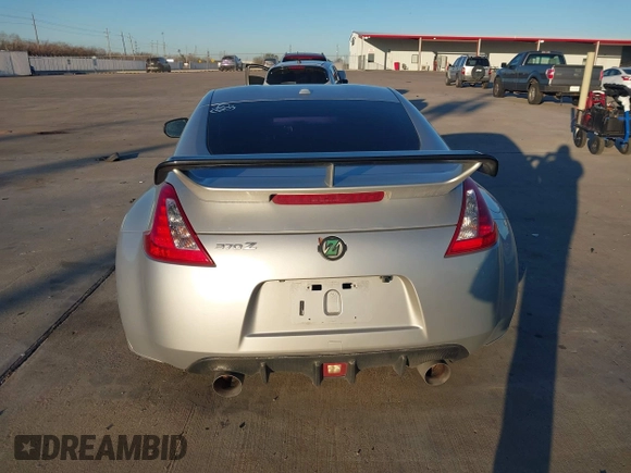 2014 Nissan 370Z Nismo with VIN JN1AZ4EH4EM634236, listed as a IAAI auction lot 41256664 with 80,294 mi miles and . Bid and sale history available at DreamBid. Image 15.