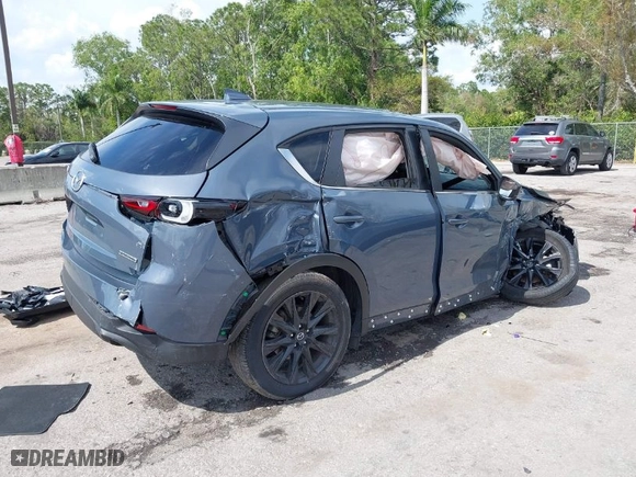 2022 Mazda CX-5 2.5 S Carbon Edition with VIN JM3KFBCM4N0529516, listed as a IAAI auction lot 41622377 with NaN miles. Bid and sale history available at carsss.com. Image 4.