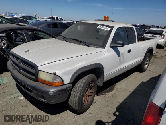 2002 Dodge Dakota with VIN 1B7GL12X92S701455, listed as a Copart auction lot 66929624 with 64,563 mi miles and Salvage Title. Bid and sale history available at carsss.com. Image 1.