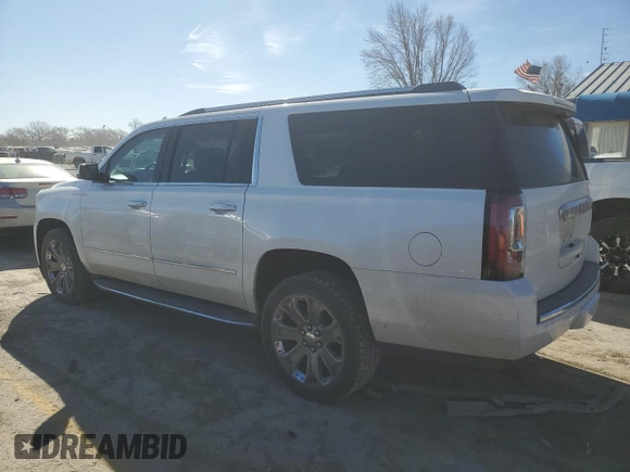2016 GMC Yukon XL Denali with VIN 1GKS2HKJ5GR225936, listed as a Copart auction lot 49353985 with 207,658 mi miles and Salvage Title. Bid and sale history available at DreamBid. Image 2.