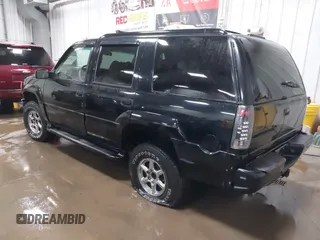 2000 GMC Denali with VIN 1GKEK13R9YR163824, listed as a IAAI auction lot 41245808 with 206,773 mi miles. Bid and sale history available at carsss.com. Image 3.