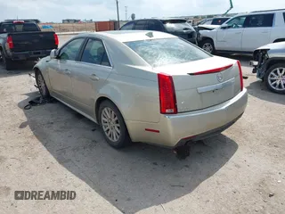 2013 Cadillac CTS Luxury with VIN 1G6DE5E55D0120843, listed as a IAAI auction lot 42145982 with 147,127 mi miles and . Bid and sale history available at DreamBid. Image 3.