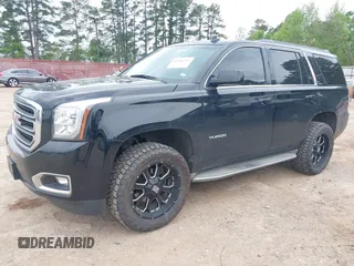 2015 GMC Yukon SLT with VIN 1GKS1BKC5FR274408, listed as a IAAI auction lot 41942157 with 165,978 mi miles. Bid and sale history available at carsss.com. Image 17.