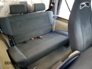1999 Jeep Wrangler Sahara with VIN 1J4FY49SXXP414414, listed as a Copart auction lot 41643665 with 154,810 mi miles and Salvage Title. Bid and sale history available at carsss.com. Image 11.