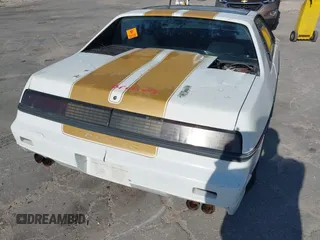 1986 Pontiac Fiero z VIN 1G2PF3797GP269850, wystawiony jako IAAI lot #40722755 z przebiegiem 129 077 mil mil oraz . Historia ofert i sprzedaży dostępna na DreamBid. Obrazek 13.