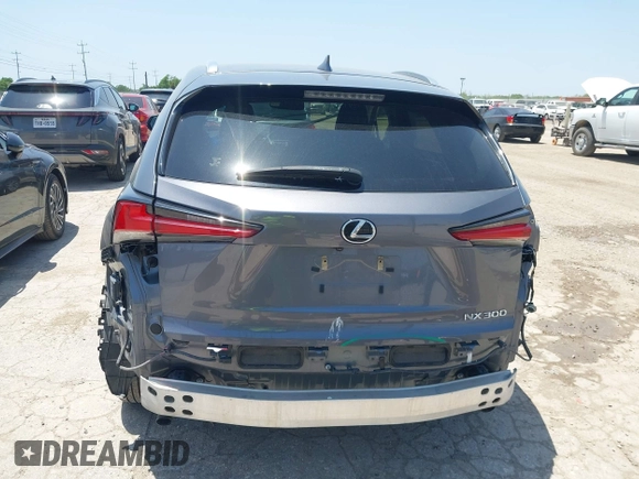 2021 Lexus NX 300 with VIN JTJDARBZ6M2195561, listed as a IAAI auction lot 42220079 with 49,757 mi miles and . Bid and sale history available at DreamBid. Image 17.