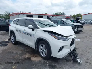2021 Toyota Highlander L z VIN 5TDBZRBH9MS546806, wystawiony jako IAAI lot #42098520 z przebiegiem 152 711 mil mil oraz . Historia ofert i sprzedaży dostępna na DreamBid. Obrazek 1.