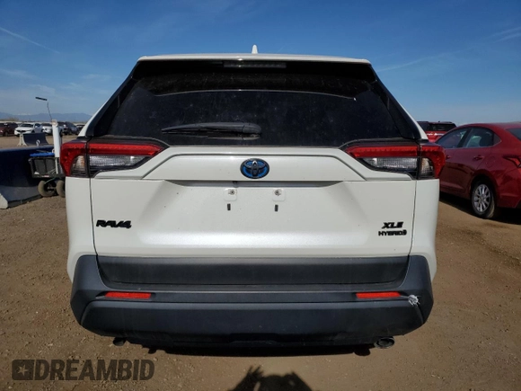 2022 Toyota RAV4 Hybrid XLE Premium with VIN JTMB6RFV1ND521761, listed as a Copart auction lot 54263055 with 46,391 mi miles and Salvage title. Bid and sale history available at DreamBid. Image 6.