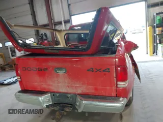2000 Dodge Dakota Sport z VIN 1B7GG2AN5YS793828, wystawiony jako IAAI lot #41955863 z przebiegiem 267 861 mil mil oraz . Historia ofert i sprzedaży dostępna na DreamBid. Obrazek 16.