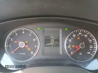 2014 Volkswagen Jetta SE with VIN 3VWD17AJ0EM423581, listed as a Copart auction lot 57253094 with 126,610 mi miles and Salvage title. Bid and sale history available at DreamBid. Image 9.