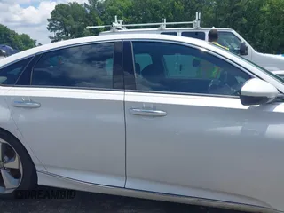 2019 Honda Accord Touring with VIN 1HGCV2F96KA015987, listed as a IAAI auction lot 42528744 with 174,735 mi miles and . Bid and sale history available at DreamBid. Image 14.