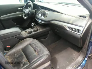 2021 Cadillac XT4 FWD Premium Luxury with VIN 1GYFZCR48MF004009, listed as a IAAI auction lot 41956723 with 82,483 mi miles. Bid and sale history available at carsss.com. Image 5.