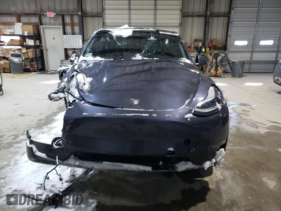 2023 Tesla Model Y Long Range z VIN 7SAYGAEE3PF968231, wystawiony jako Copart lot #45811385 z przebiegiem Nie podano mil oraz Szkoda całkowita • Salvage title. Historia ofert i sprzedaży dostępna na DreamBid. Obrazek 5.