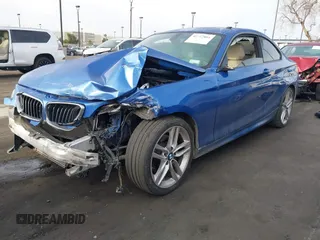 2015 BMW 2 Series 228i with VIN WBA1F5C59FVW98205, listed as a IAAI auction lot 41722804 with 91,879 mi miles. Bid and sale history available at carsss.com. Image 21.