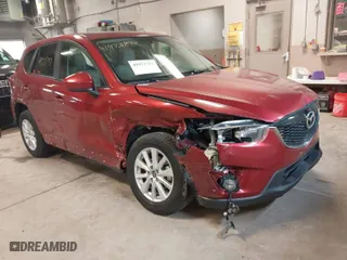 2013 Mazda CX-5 Touring with VIN JM3KE4CEXD0120913, listed as a IAAI auction lot 41973792 with 129,202 mi miles. Bid and sale history available at carsss.com. Image 1.