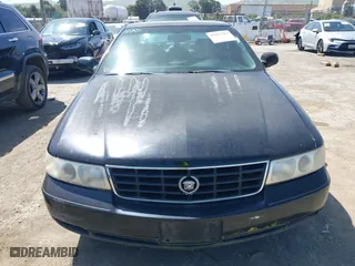 1998 Cadillac Seville Touring STS with VIN 1G6KY5499WU916185, listed as a IAAI auction lot 42035783 with 164,763 mi miles. Bid and sale history available at carsss.com. Image 6.