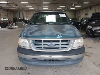 2000 Ford F-150 XL with VIN 2FTZF1722YCA27112, listed as a IAAI auction lot 42687404 with Not provided miles and . Bid and sale history available at DreamBid. Image 13.
